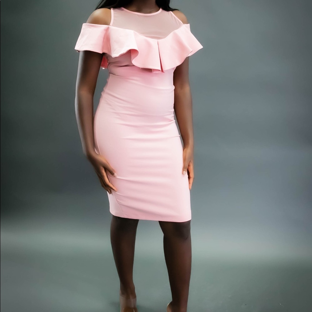 Pink cocktail bodycon dress with cut off shoulder.